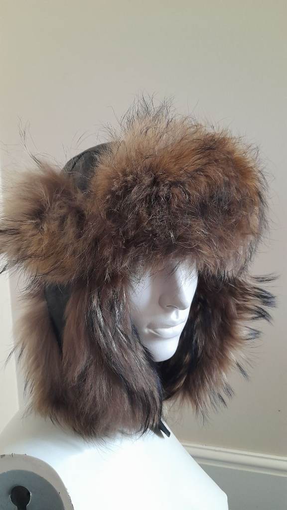 A beautiful reproduction Leather and fur trapper hat in absolutely beautiful condition 