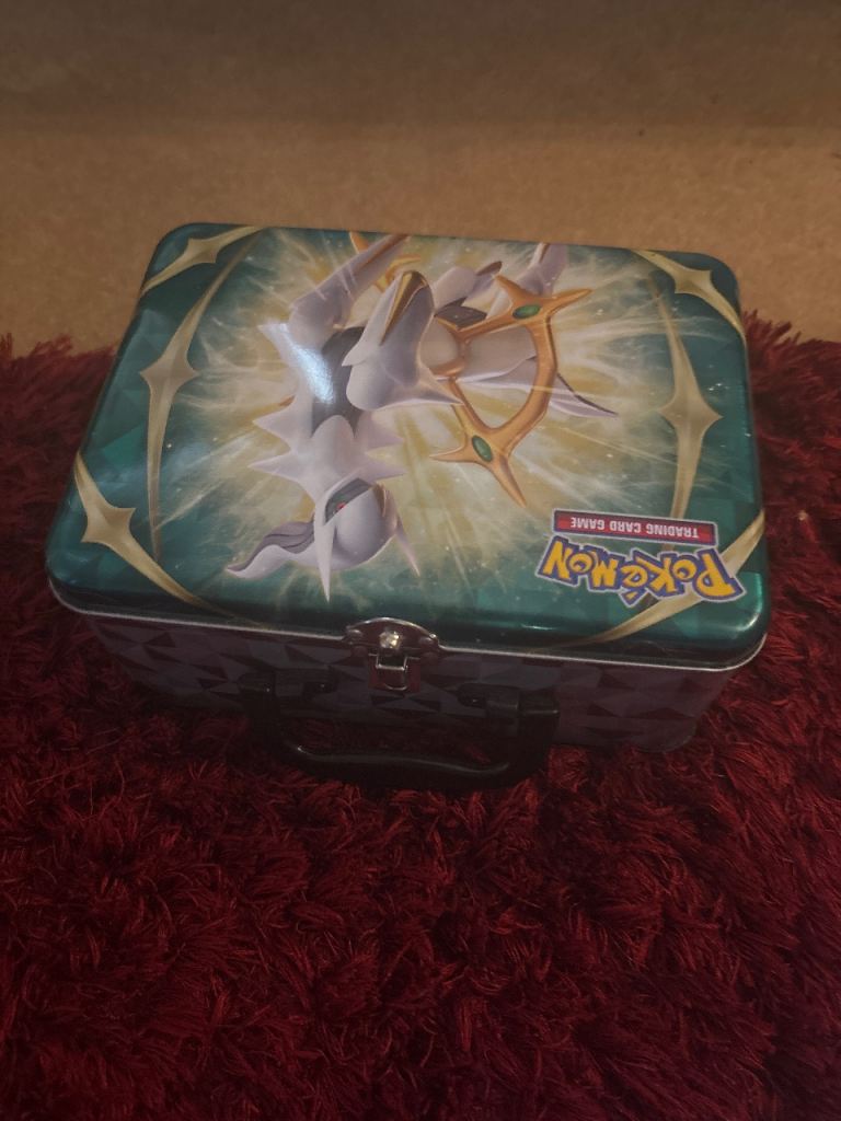 Tin full of pokemon cards