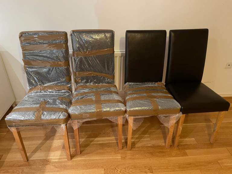 Set of 4 Black Faux Leather Dining Chairs with Solid Wood Legs