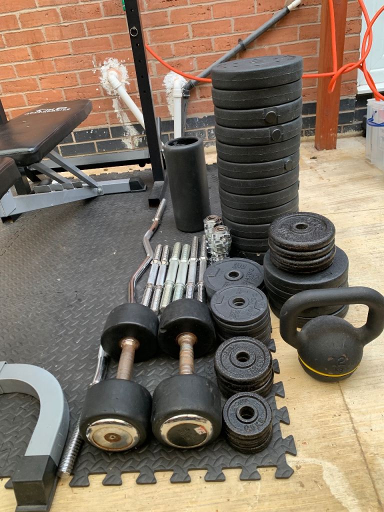 100KG + adjustable Dumbells and curl bar 