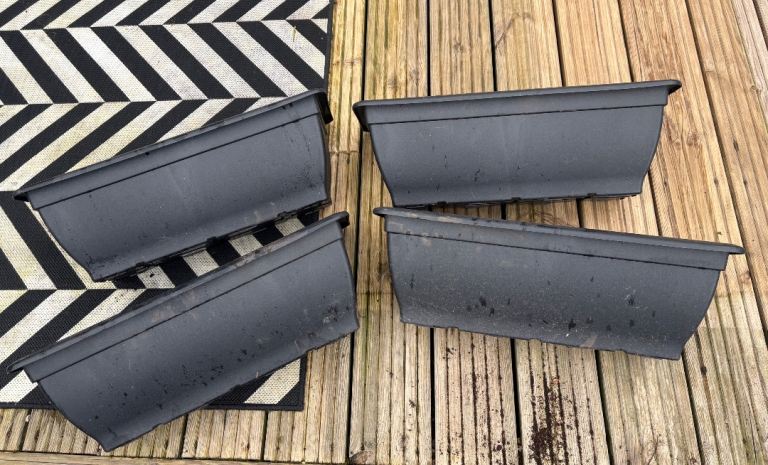 Set of 4 black plant troughs
