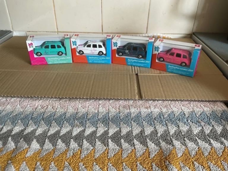 4 Boxed Corgi London 2012 Destination Taxi Vehicles