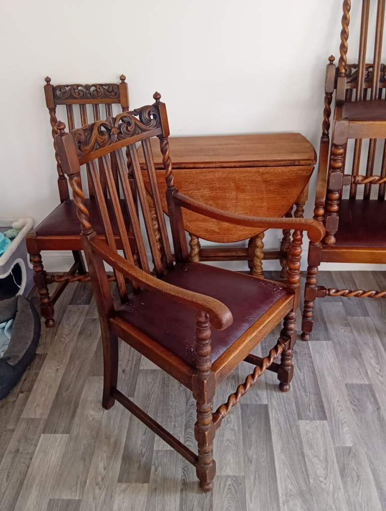 Antique drop leaf table and 4 chairs 