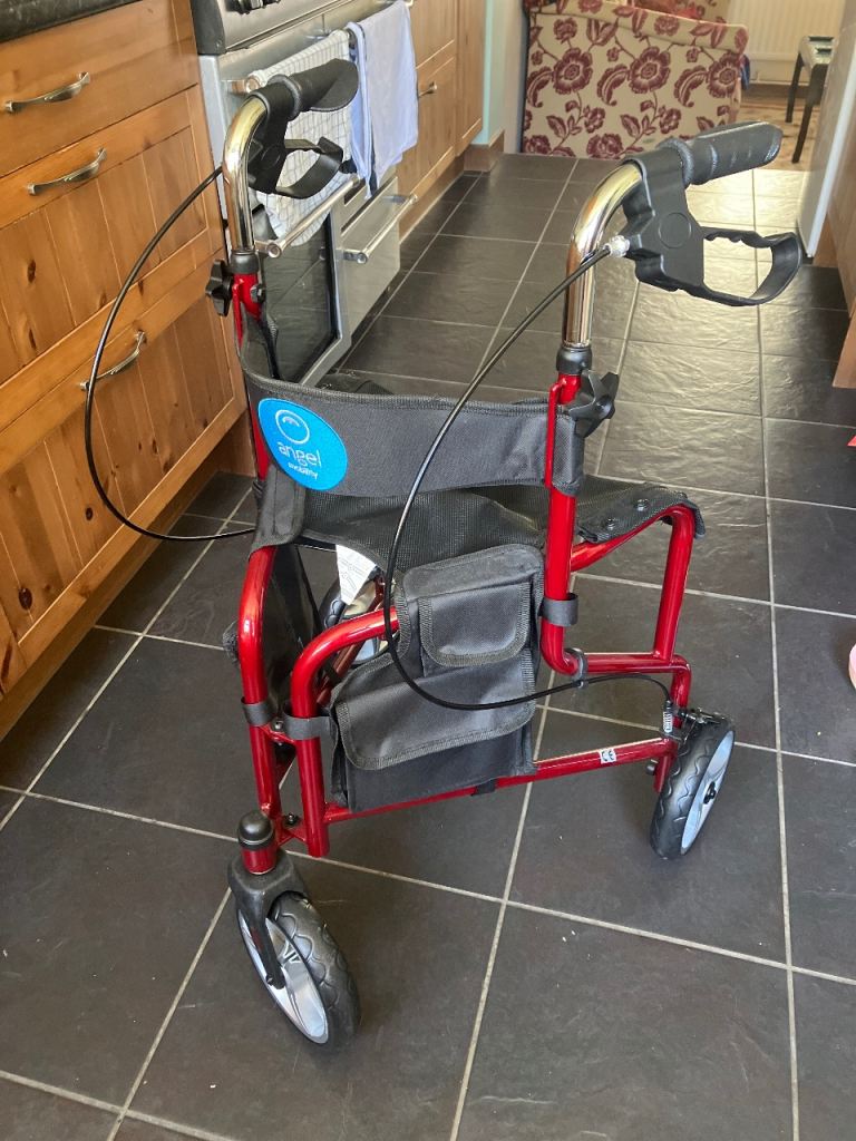 Angel mobility three wheel walker with seat. Hardly used 