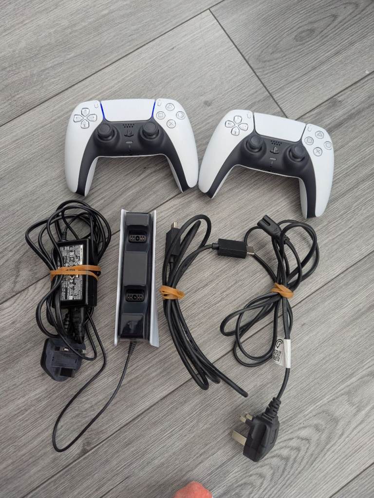 PS5 Disc Edition + 2 Controllers + Charging Station – Like New