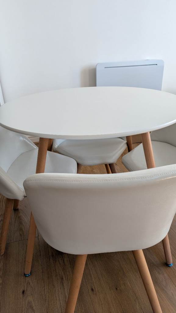 Round dining table and chairs
