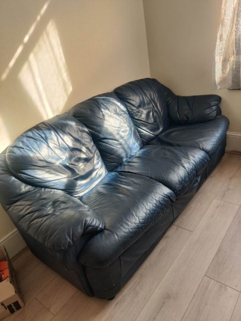 Large Blue Leather Sofa – Used Condition
