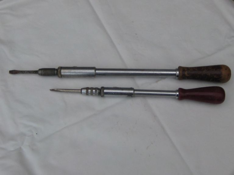  Vintage Pump action Yankie screw drivers, 1 Large, 1 small carpenter tools