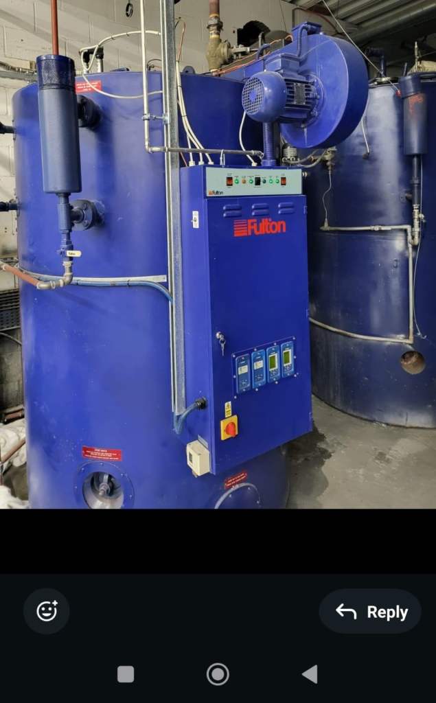 Fulton 40J vertical oil fired industrial steam boiler for sale. Good working condition.