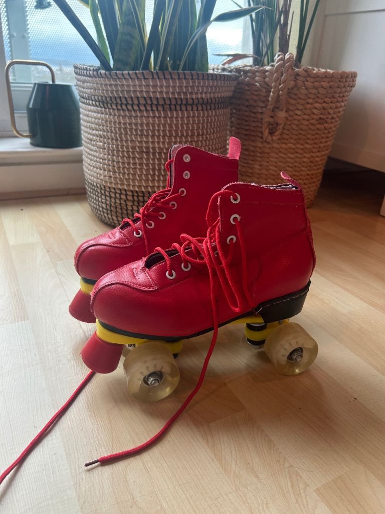 Vintage leather red roller skates 