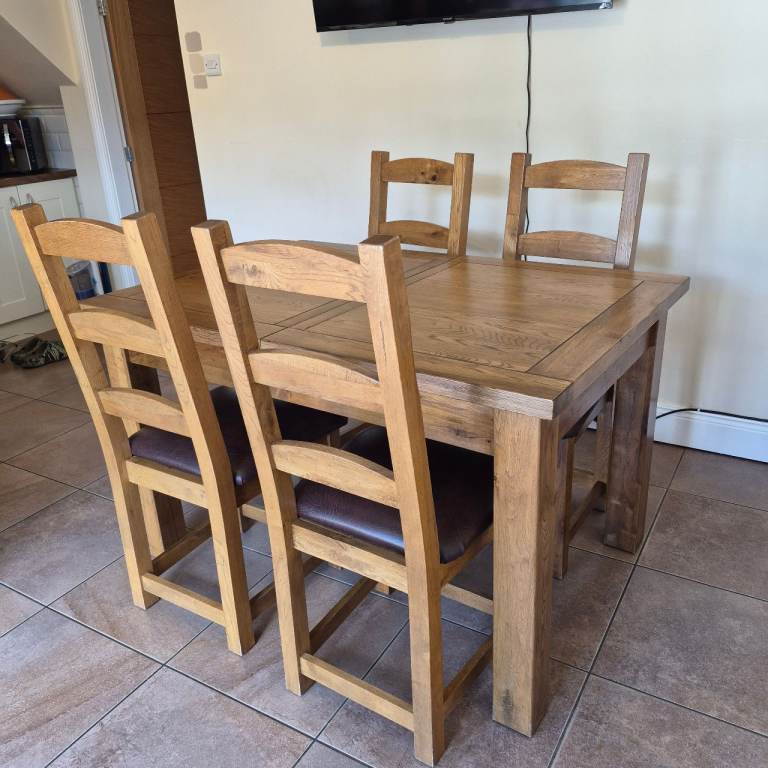 Solid Wood Dining Table and 4 Chairs – Good Condition