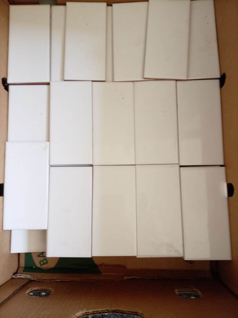 Box of New White Ceramic Wall Tiles