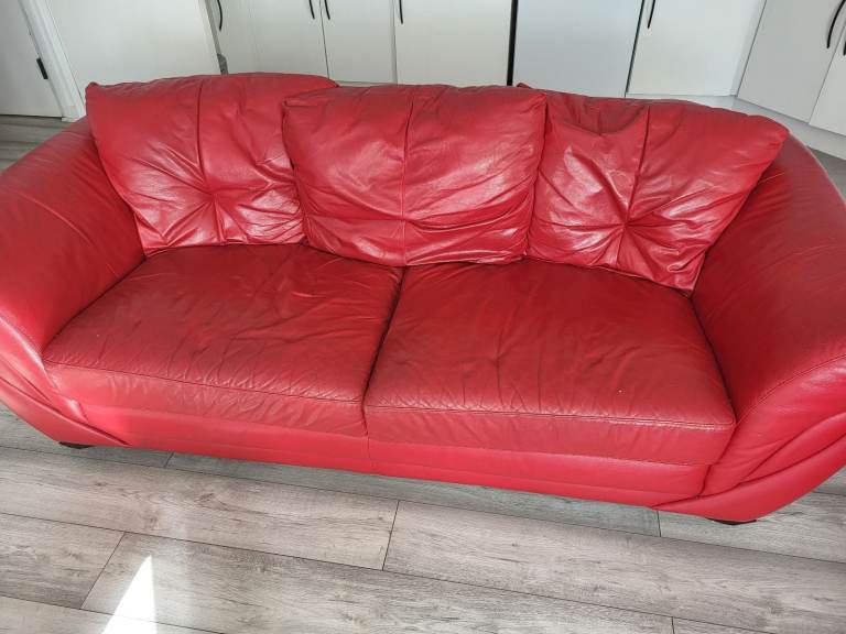 2 seater, 3 seater and reclining armchair red leather