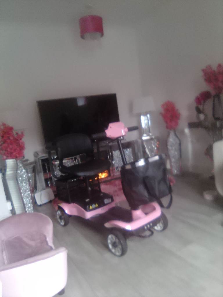 Pink mobility scooter 