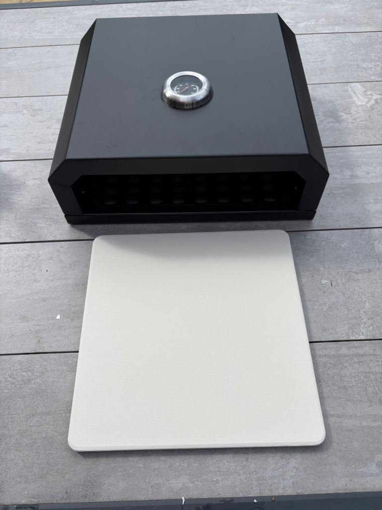 Brand new BBQ top pizza oven including pizza stone 