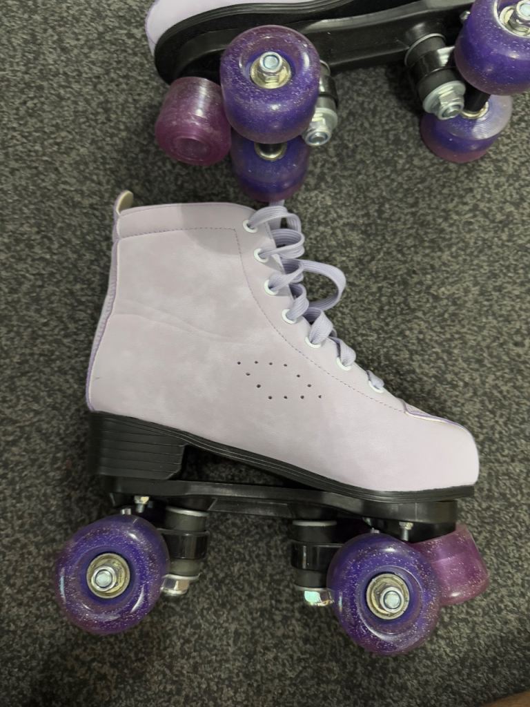 Girls uk size 4 purple roller skates never worn 