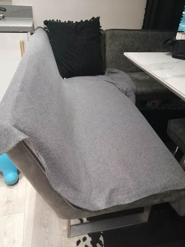 Table with corner chair, sofa and bench