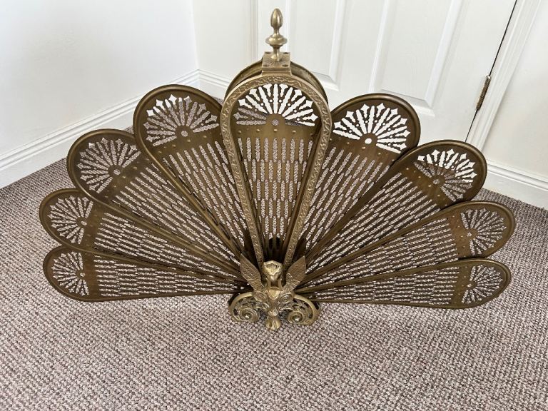 Rare antique brass peacock fire guard