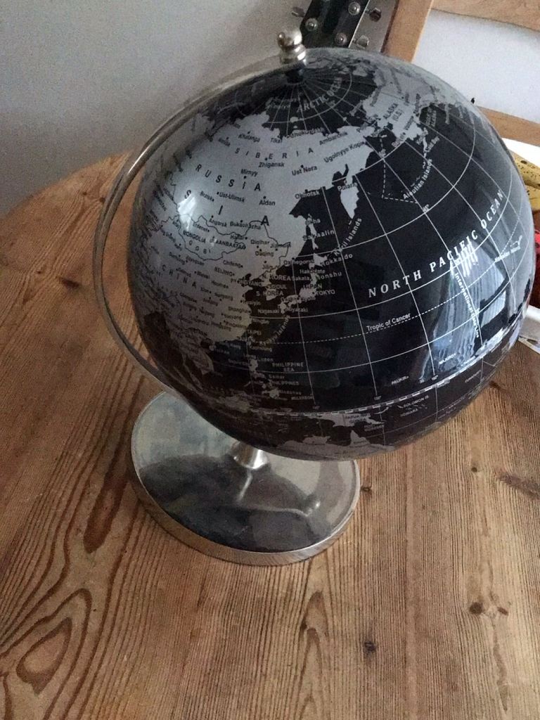 Stylish Black and Silver World Globe – Good Condition
