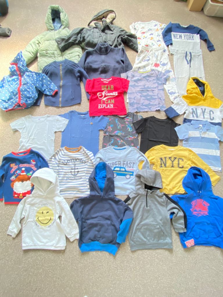 Bundles of boy’s clothes 