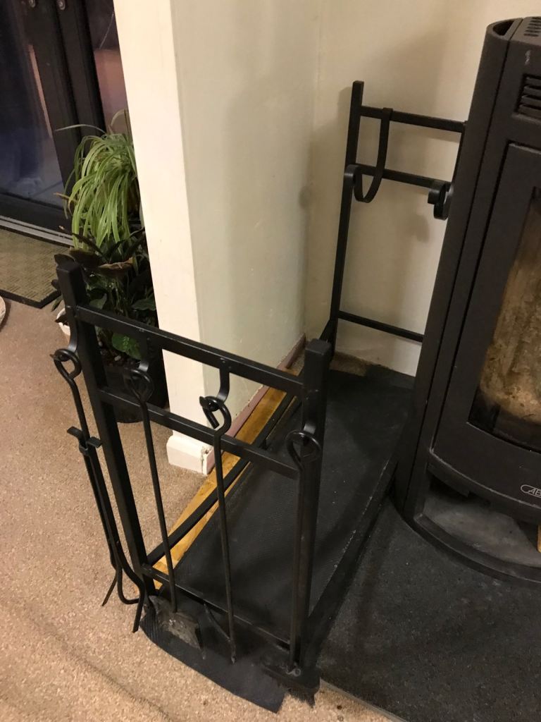 Firewood/ log stand including tools