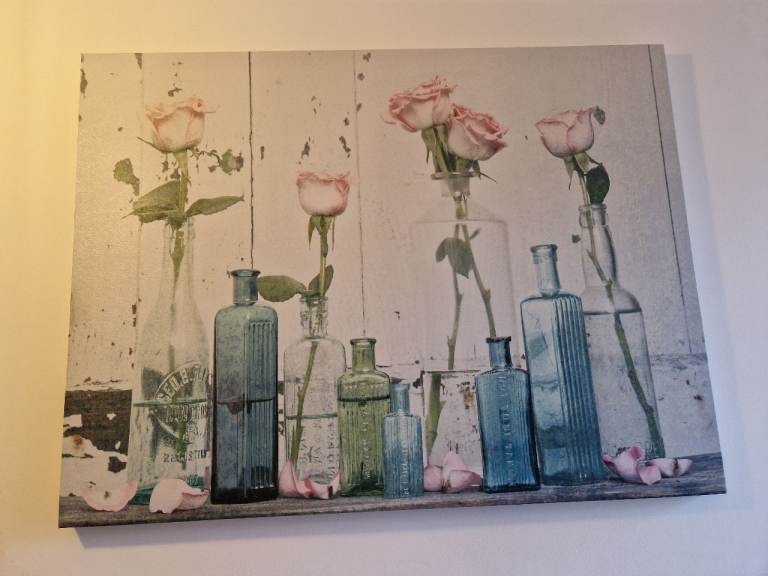 Two Floral Canvas Prints – Good Condition
