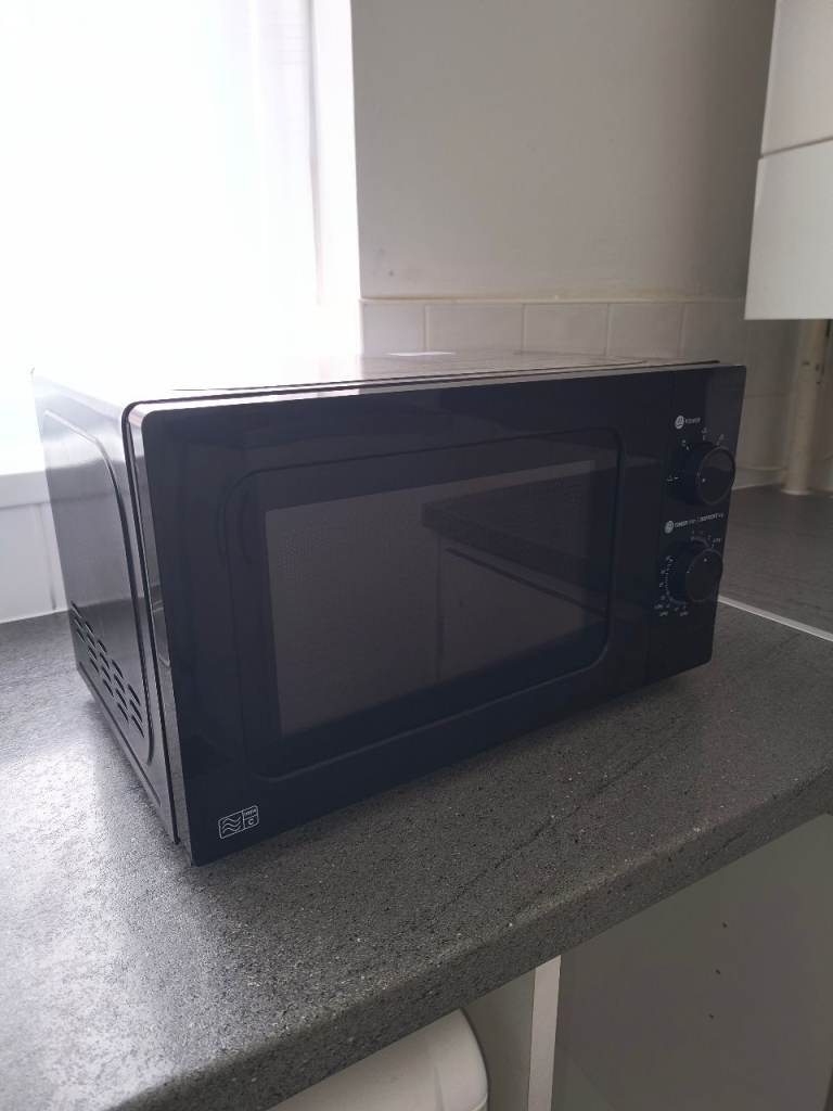 Black microwave (good and working clean)