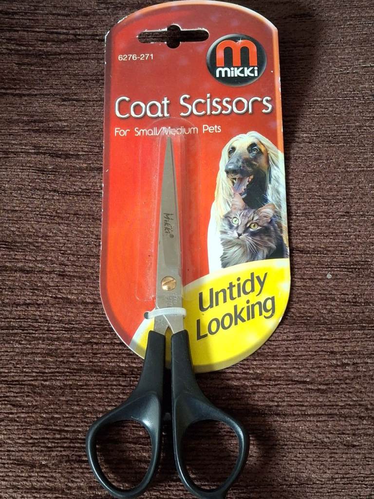 BRAND NEW AND UNOPENED PET GROOMERS SCISSORS IN EXCELLENT NEW CONDITION 