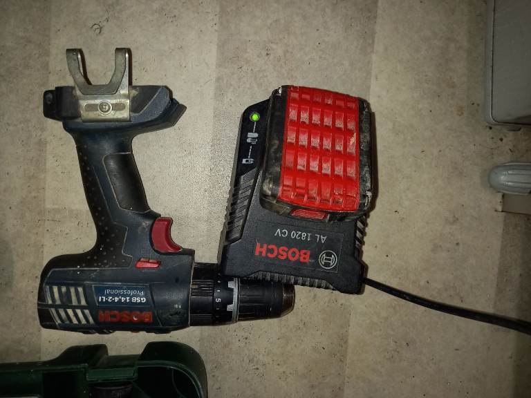 Bosch  drill battery  and  charger 
