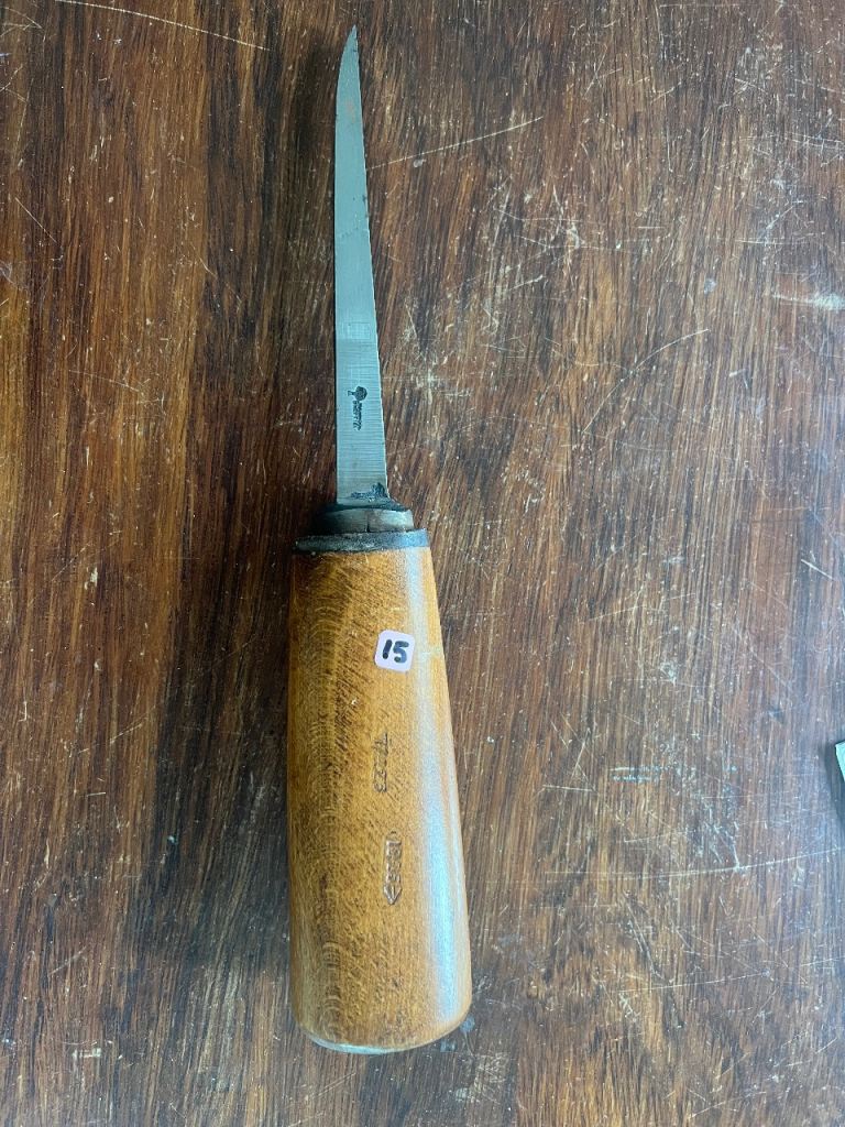 Antique wood chisel referred to as a "pig sticker" mortise chisel. 