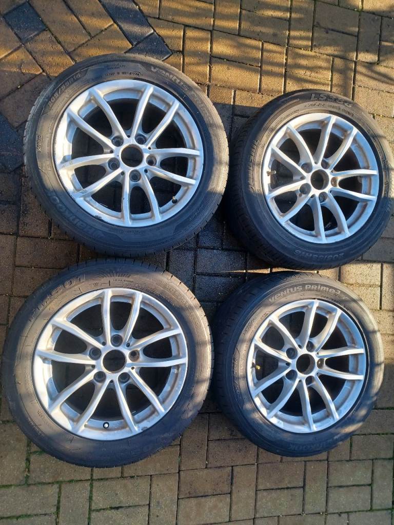 2 sets bmw alloy wheels for sale