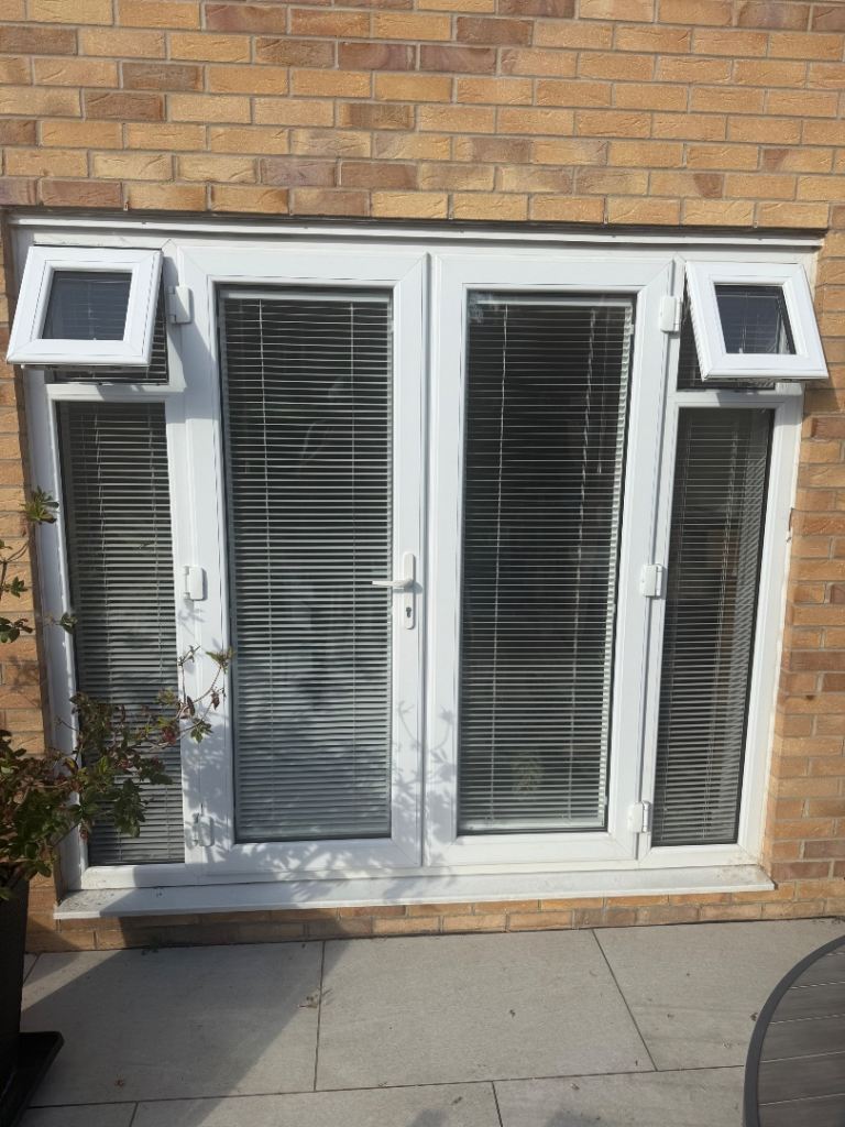 White UPVC French Doors with Side Panels and Blinds