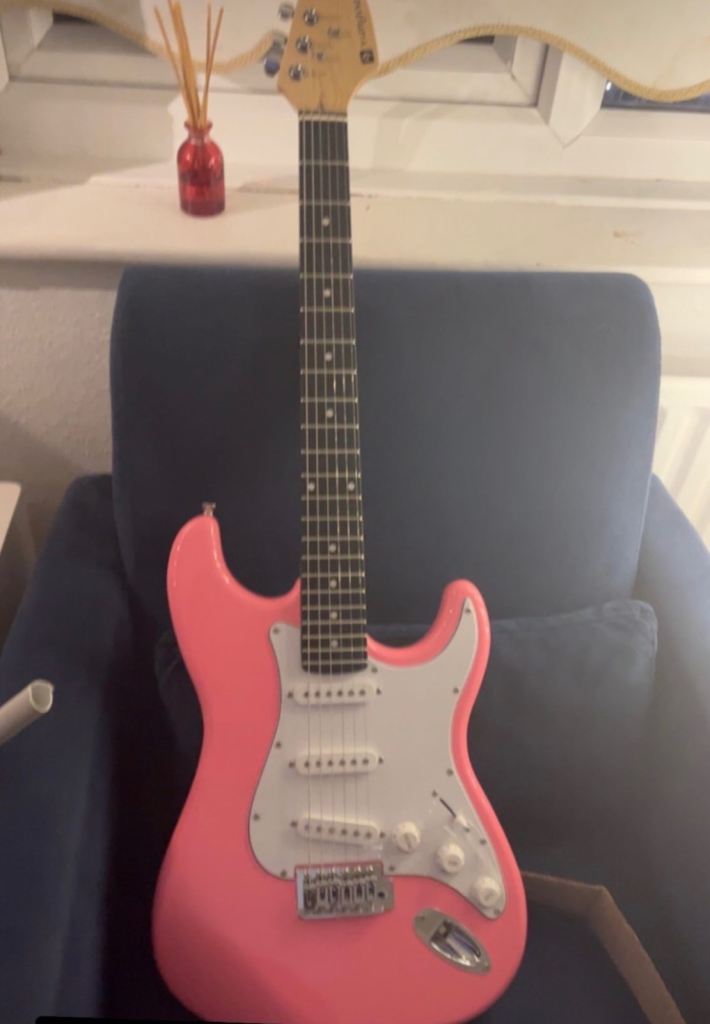 Pink Electric Guitar – Stratocaster Style, Good Condition