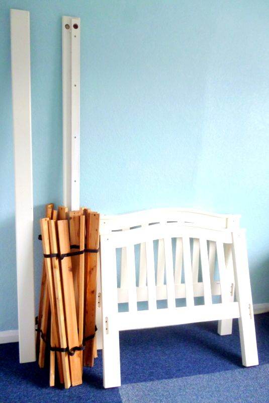 WOODEN SINGLE BED FRAME. 