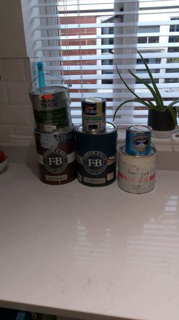 Various cans left over paint