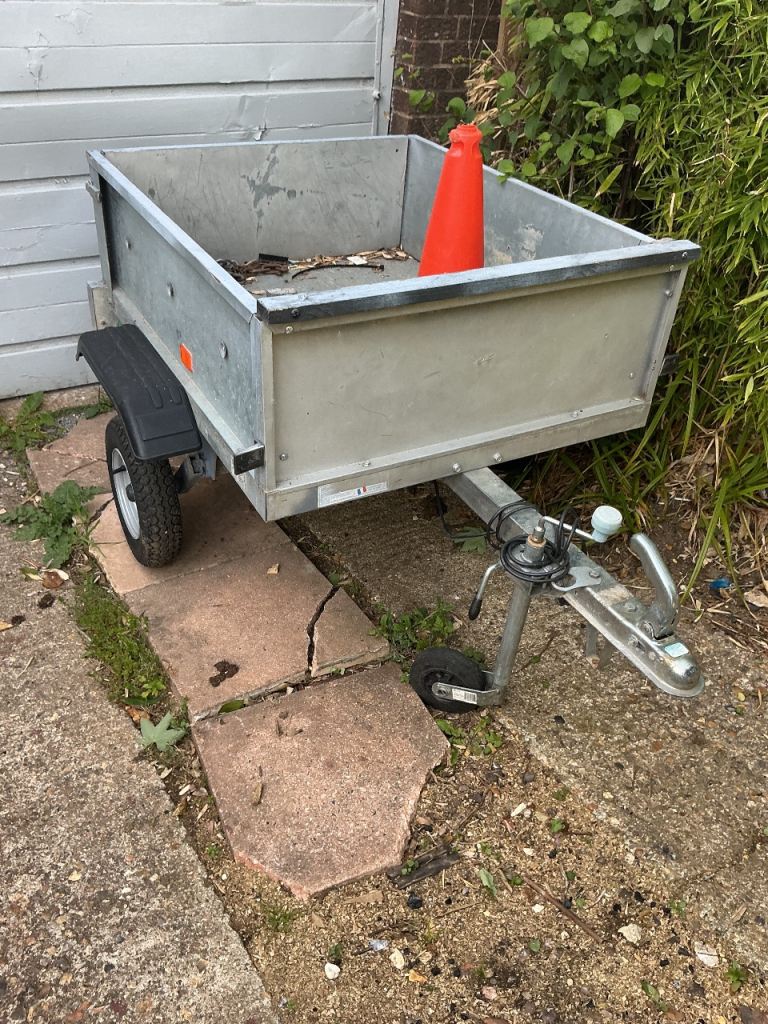 Galvanised three by four smaller car camping type trailer,brand new tyres and wheels,