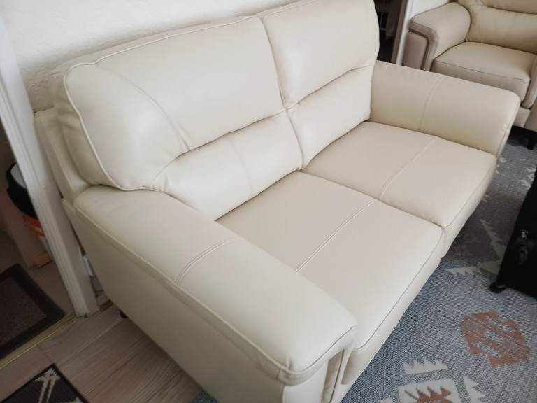 Cream leather 3 peace sofa and chairs 