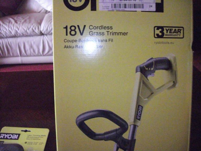 Ryobi one plus Lawn strimmer for 18v battery system and extras.