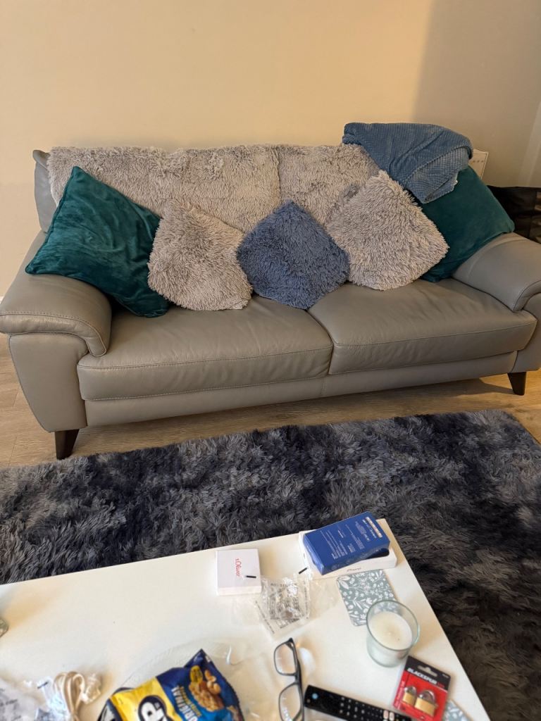 Leather sofa and chair and puffay