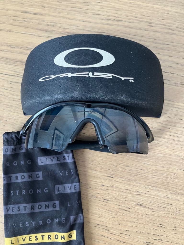 Oakley Sunglasses with Case and Pouch – Good Condition