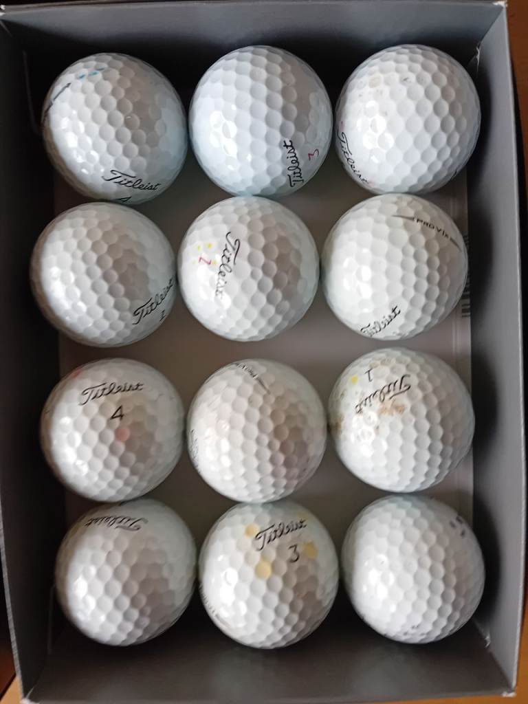 Golf putter covers and golf balls