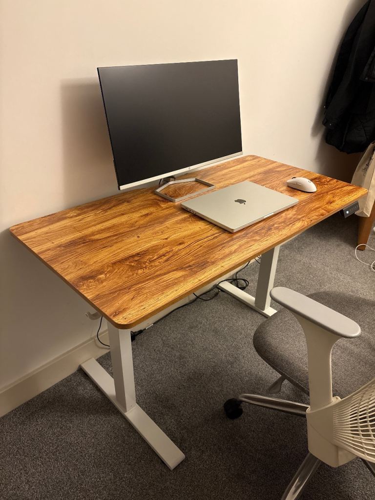 Electric height adjustable work desk