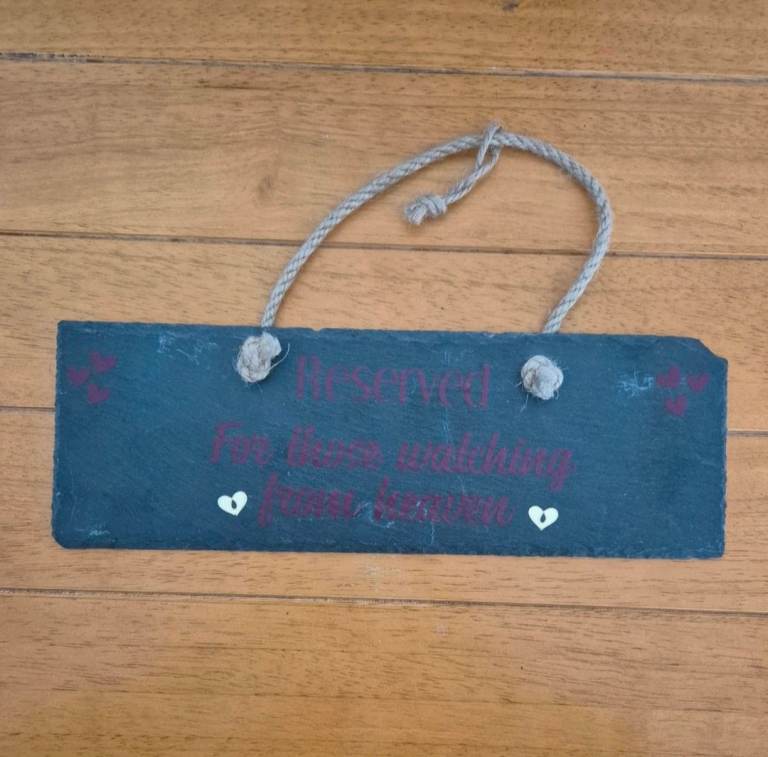 slate sign reserved for those watching from heaven