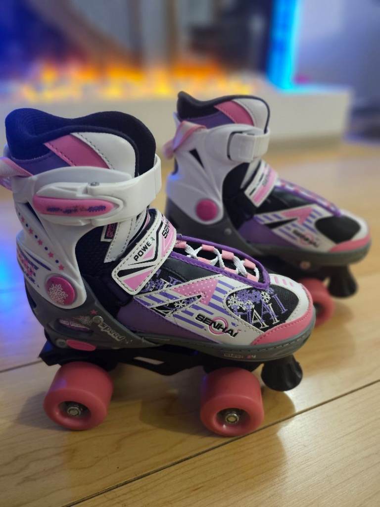 Senhai Adjustable Roller Skates. Size EU33-36, UK 1-3.