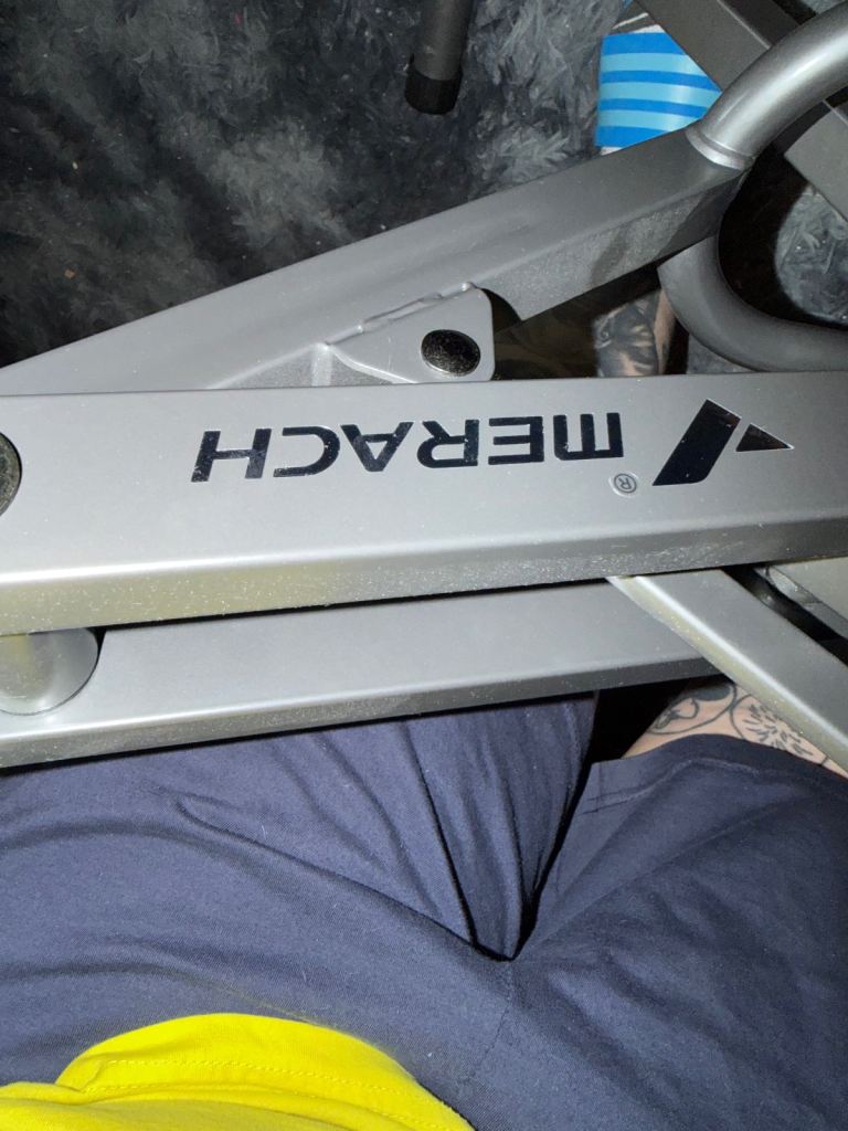 The Merach 2-in-1 Squat & Rowing Machine