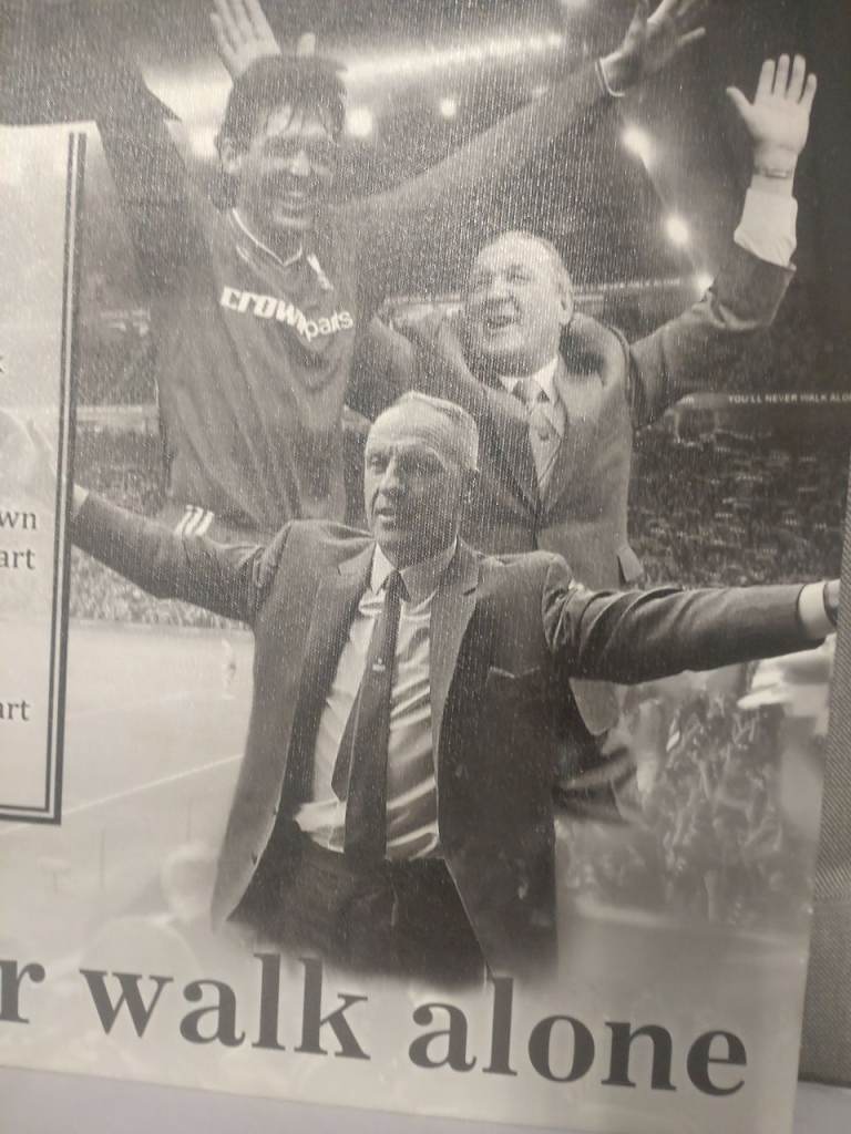Canvas of football players and the song your never walk alone pick up only 