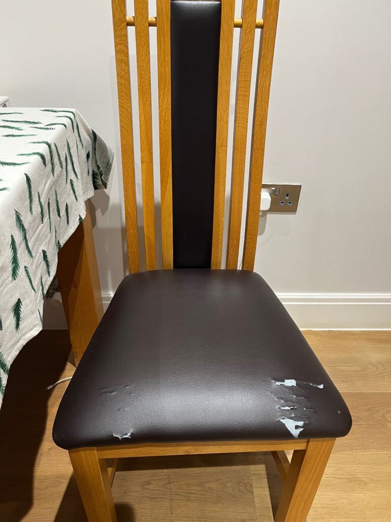 2 wooden chairs with Leather  Cushions 