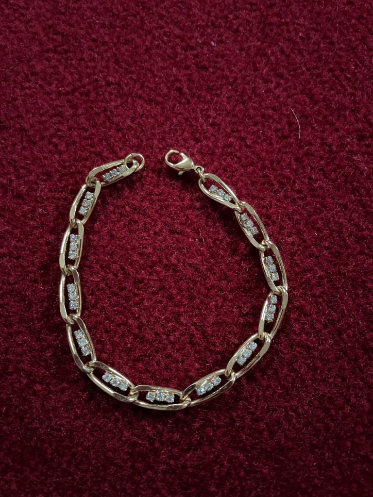 Played gold & crystal bracelet-new