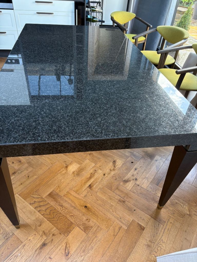 Solid black granite 8 seater dining table 