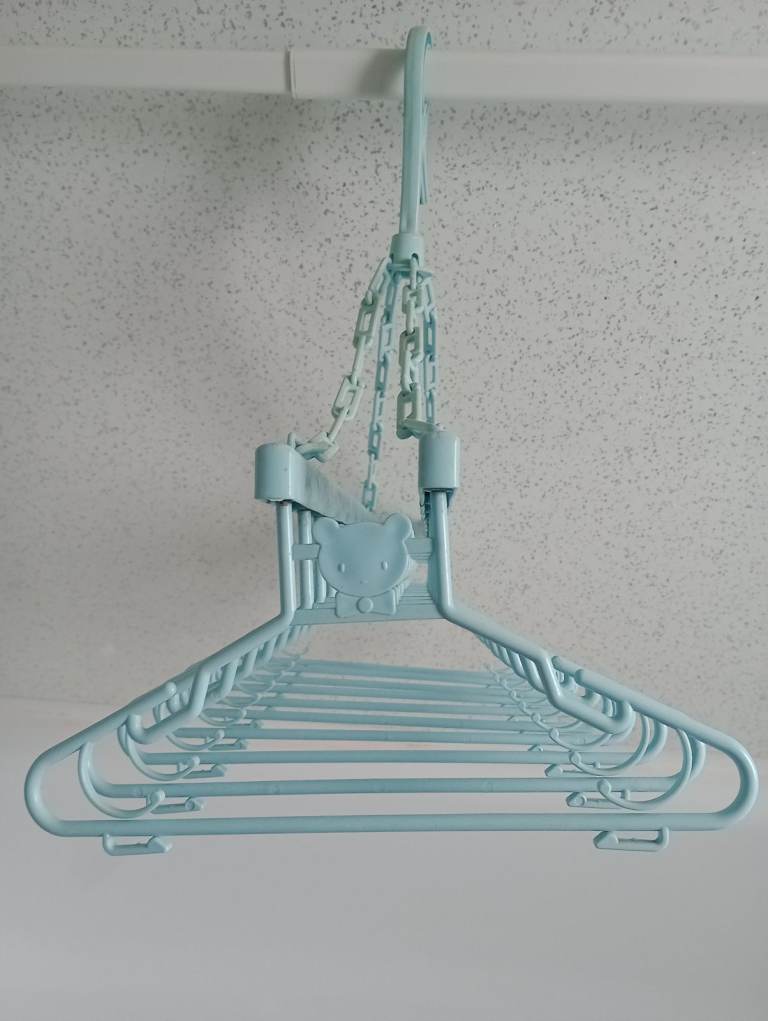 Baby clothes. Drying hanger.